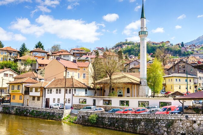 Private Walking Tour, Food Tasting and Bosnian Coffee in Sarajevo - The Old Sarajevo Clock Tower and the Sarajevo roses moment