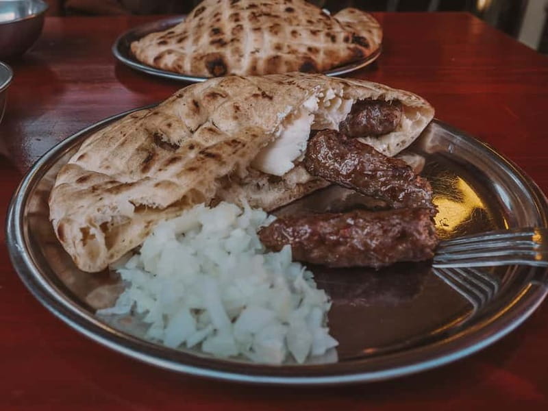 🍽️ Sarajevo Food Tour: Eat where the locals eat - General Jovan Divjak mural and photo stop: street memory with context