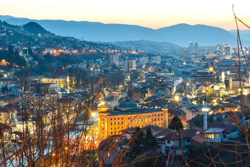 Sarajevo: Nighttime City Highlights Walking Tour - Latin Bridge to City Hall: the instant Sarajevo comes into focus